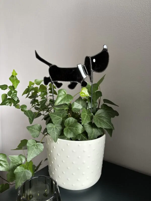Glas in lood / Tiffany glaskunst: Takkie van jip en janneke op een steel.